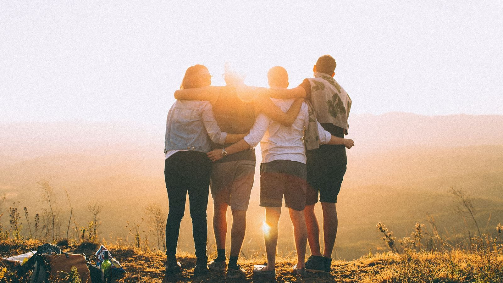 a group of people standing together in unity 