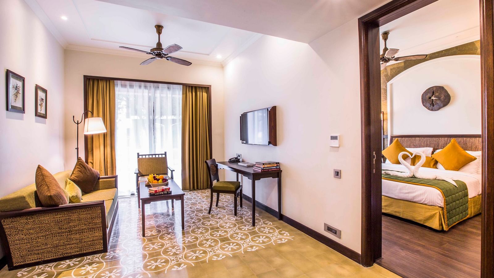 view of the attached living room with the bedroom of the Banyan Family Suite - Rhythm Lonavala