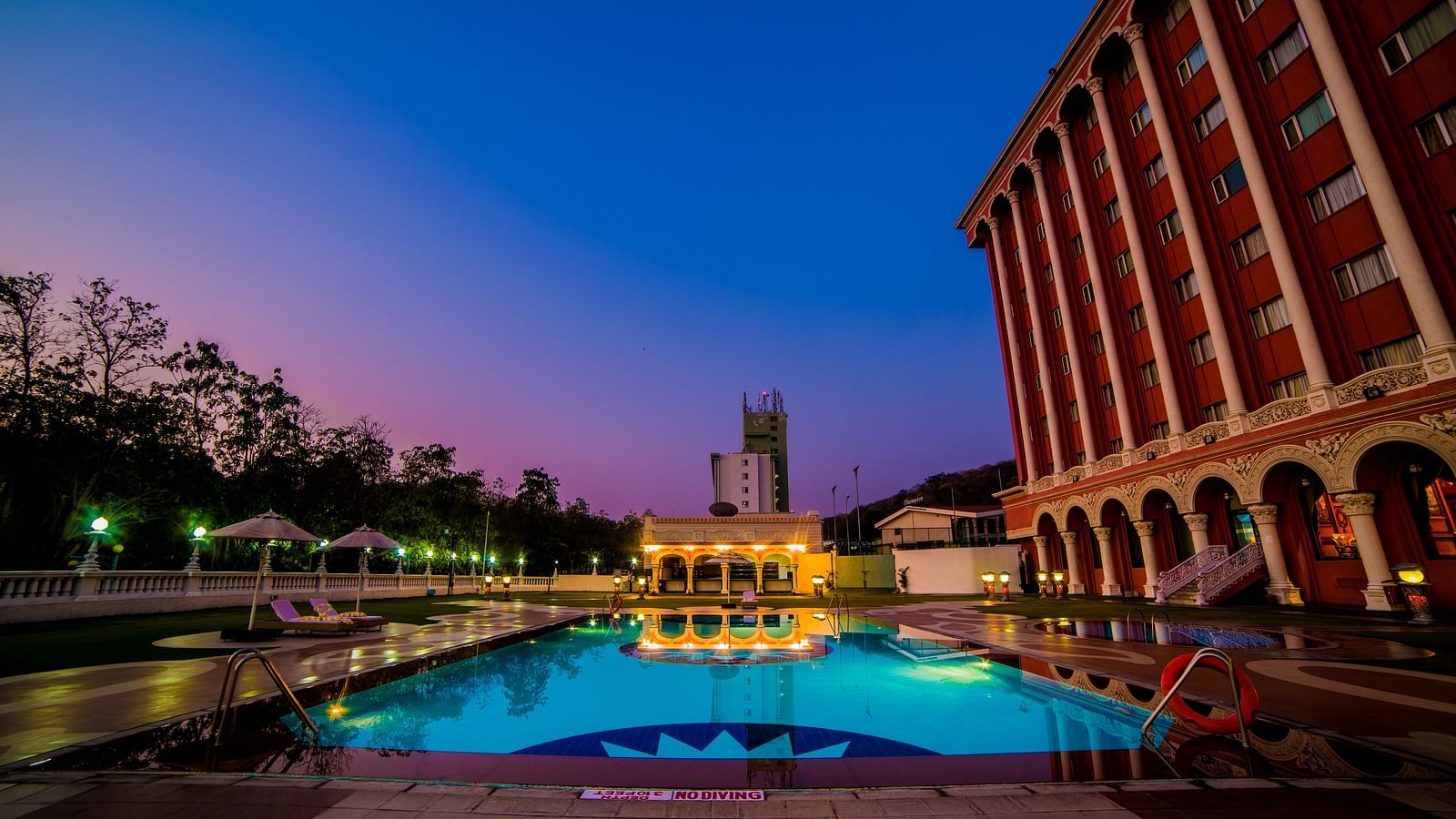 Swimming pool at Sitara Luxury Hotel in Hyderabad near Ramoji Film City during blue hour