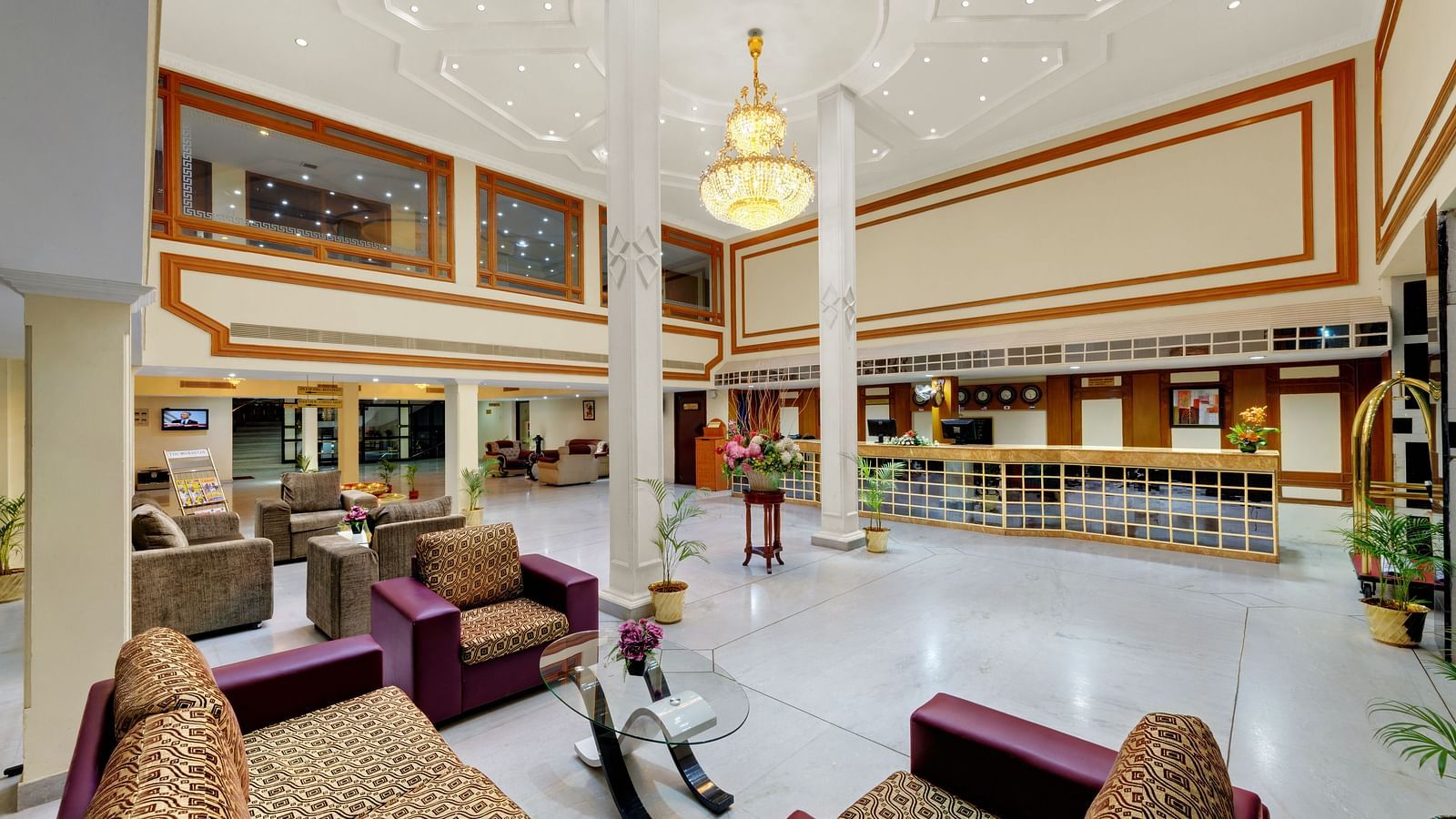 Waiting lounge with comfy sofa and table at SRM Hotel Maram Malai Nagar, Chennai