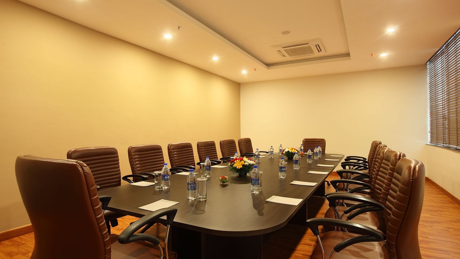 Rectangle seating arrangement inside the Board room - Starlit Suites, Kochi