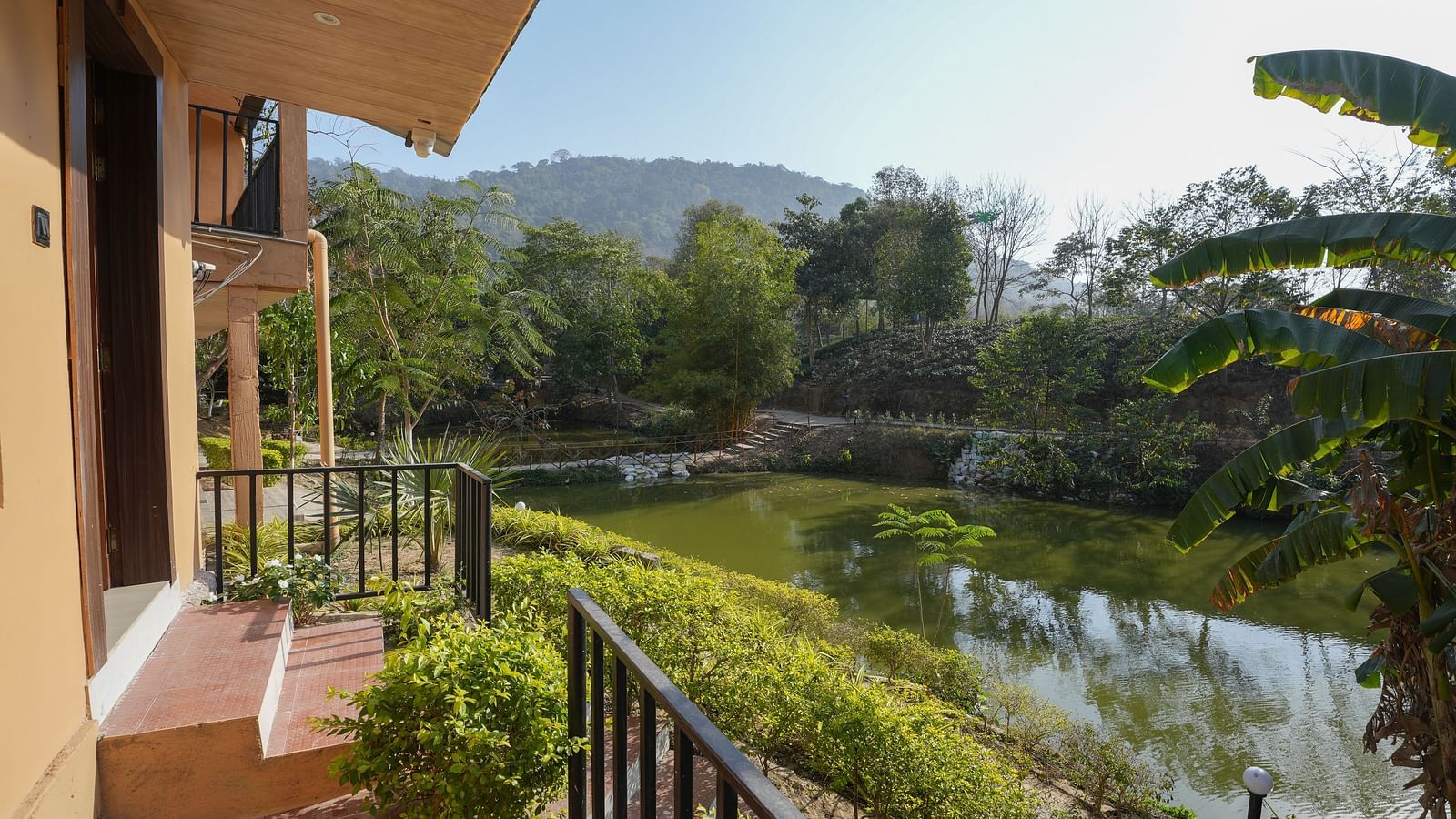 Deluxe Cottage's lake view at Summit Green Lake Tea Resort & Spa, Kaziranga