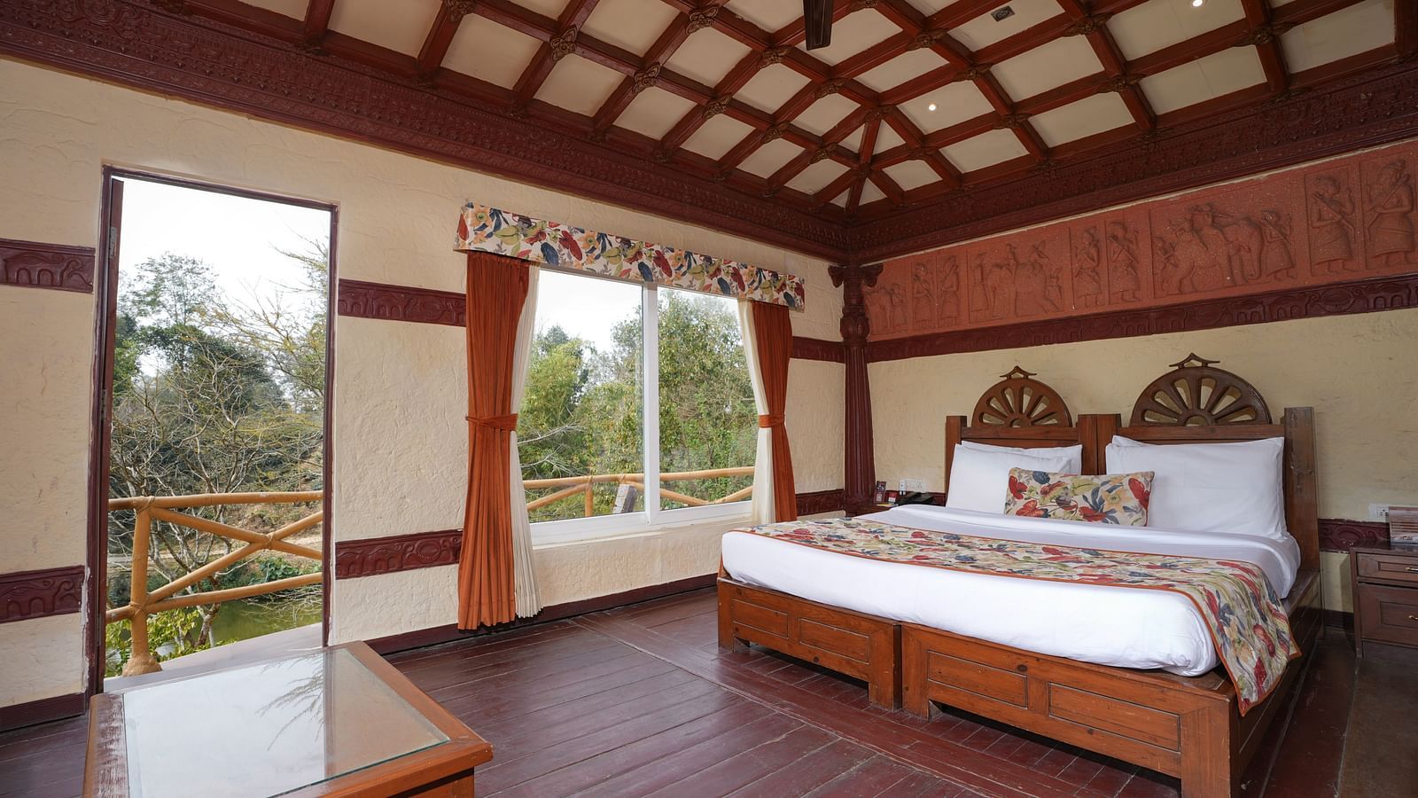 Ethnic villa offering a spacious bedroom and large windows with curtains at Summit Green Lake Tea Resort & Spa, Kaziranga