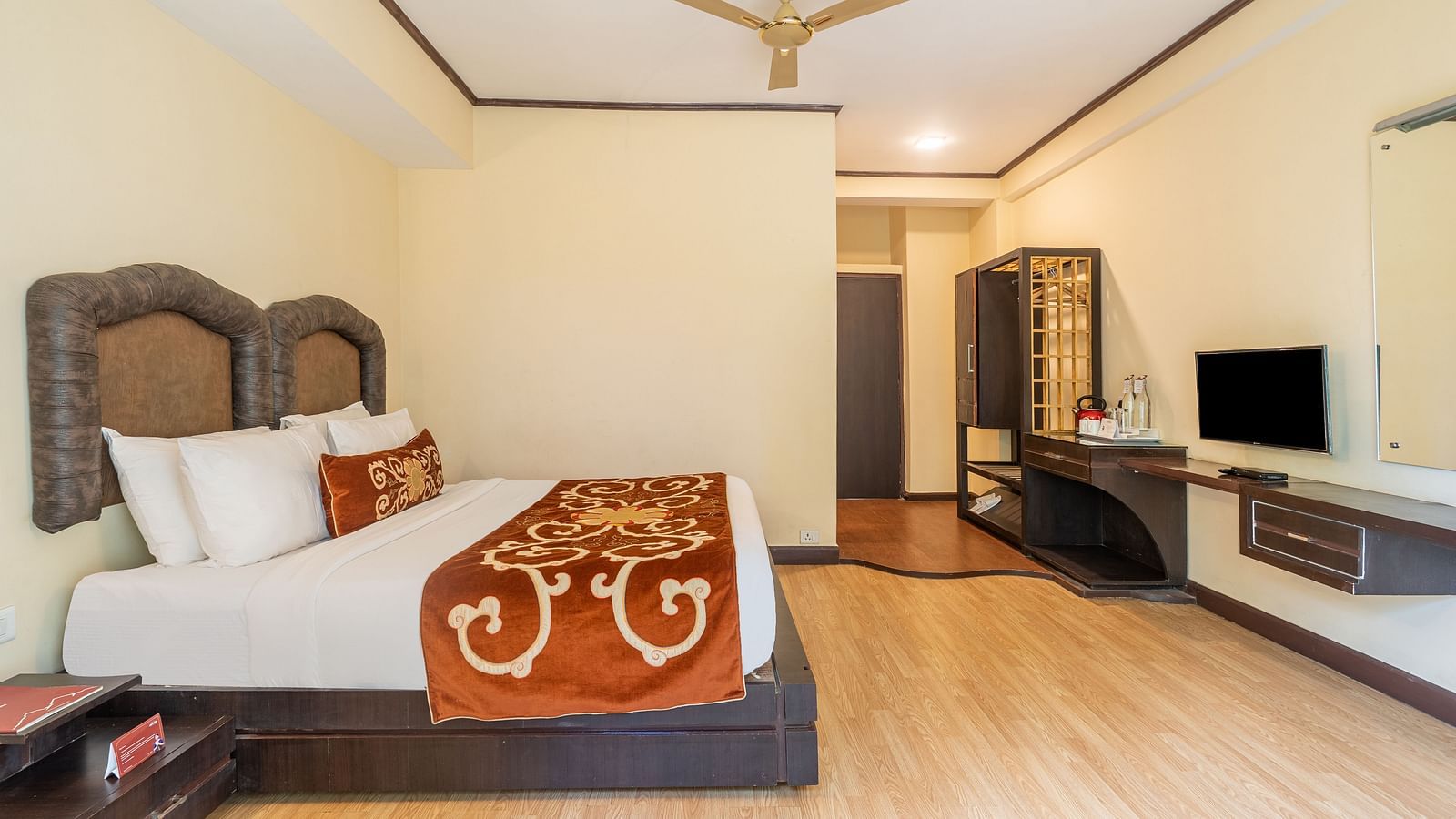 king size bed of deluxe bed at Summit Lillium Hotel & Spa, Kalimpong