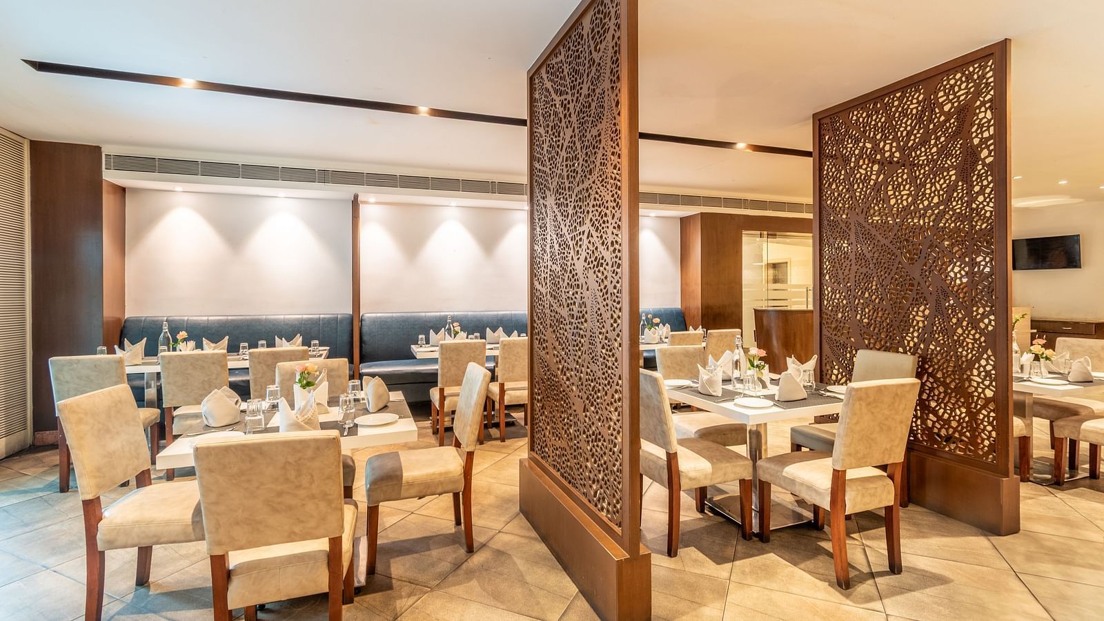 Intimate dining setup with soft lighting and modern aesthetics