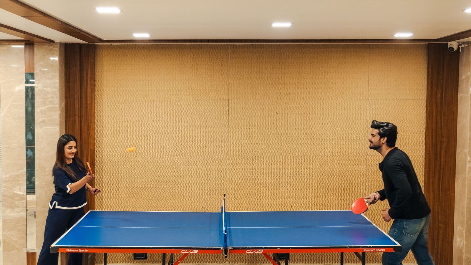  Couple playing table tennis as part of indoor activities at The Grand Legacy Resort and Spa.
