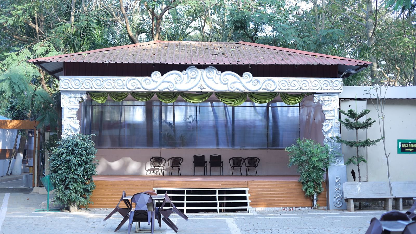 Entrance to an event hall at The Meenakshi Resort by Welcome Inn Hospitality, Bangalore.