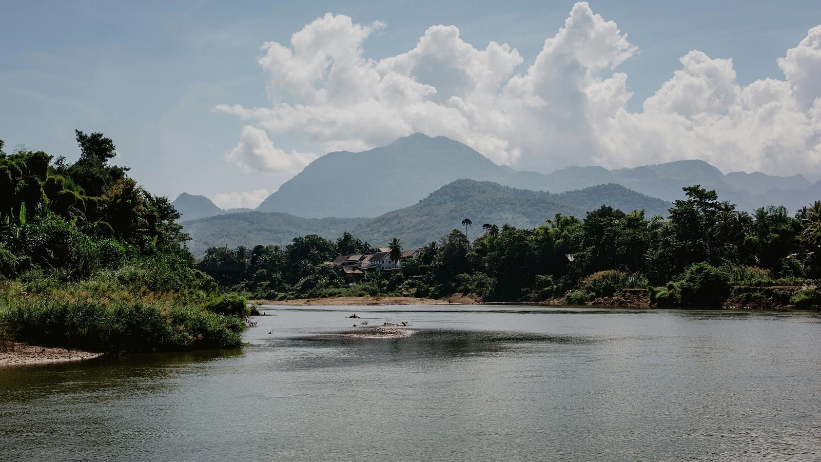 An image of a river flowing between the mountains