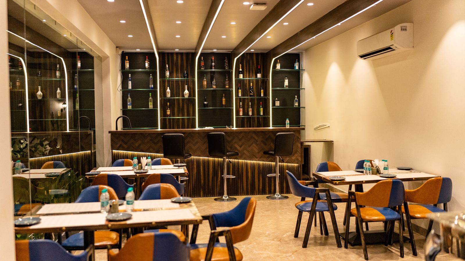 seating arrangements inside the in-house bar - The Tanisi Hotels & Resorts, Goa