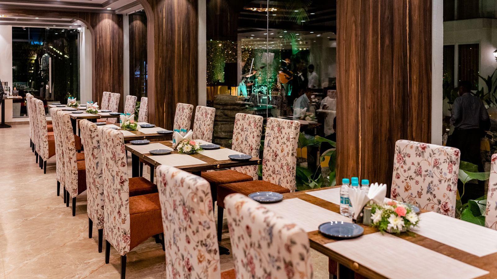 seating arrangements inside the in-house restaurant - The Tanisi Hotels & Resorts, Goa
