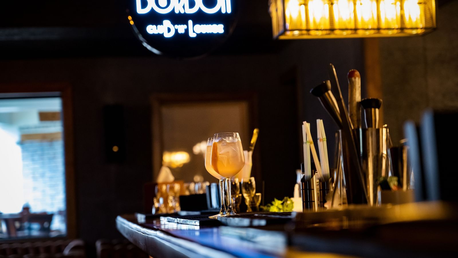 image of the bar counter top with various bar essentials at the bourbon club and lounge - The Tattva Boutique Resort