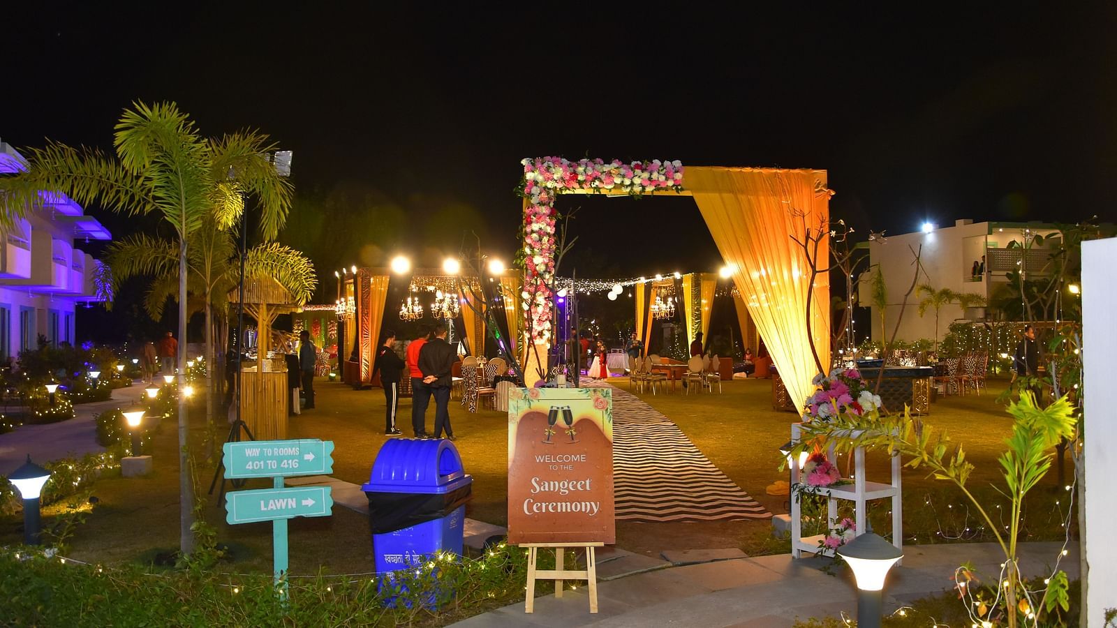 Nighttime entryway decor for a wedding event at Vedikant Resorts The Mallard Corbett.