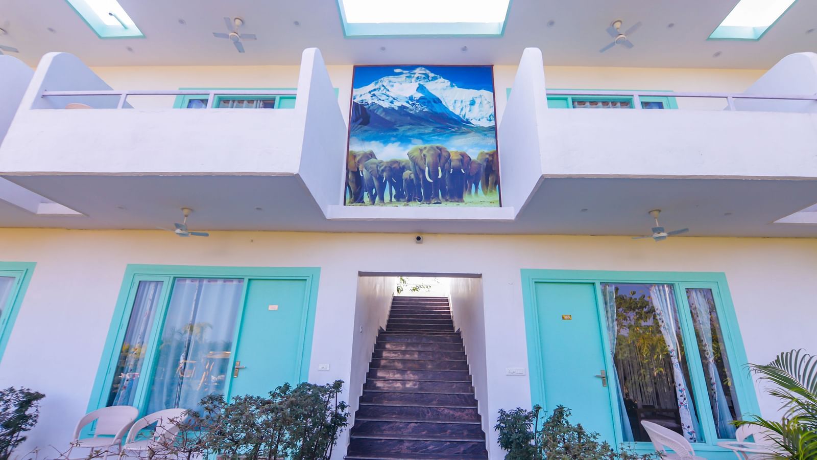 Front facade of Vedikant Resorts The Mallard Corbett with balcony rooms and landscaped entry.