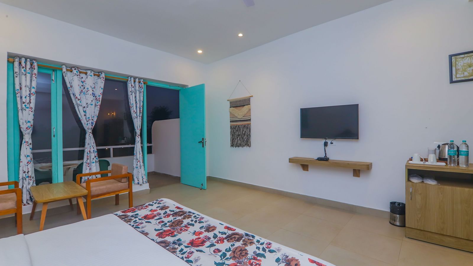 A large bedroom at Vedikant Resorts The Mallard Corbett includes a bed, seating area, and television.