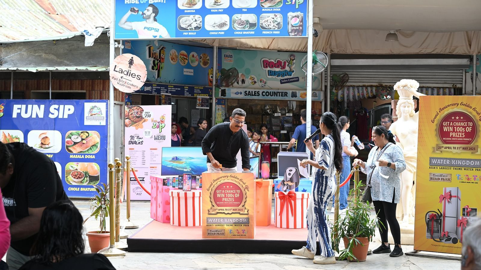Guests participating in the event activities at Water Kingdom's anniversary celebration.