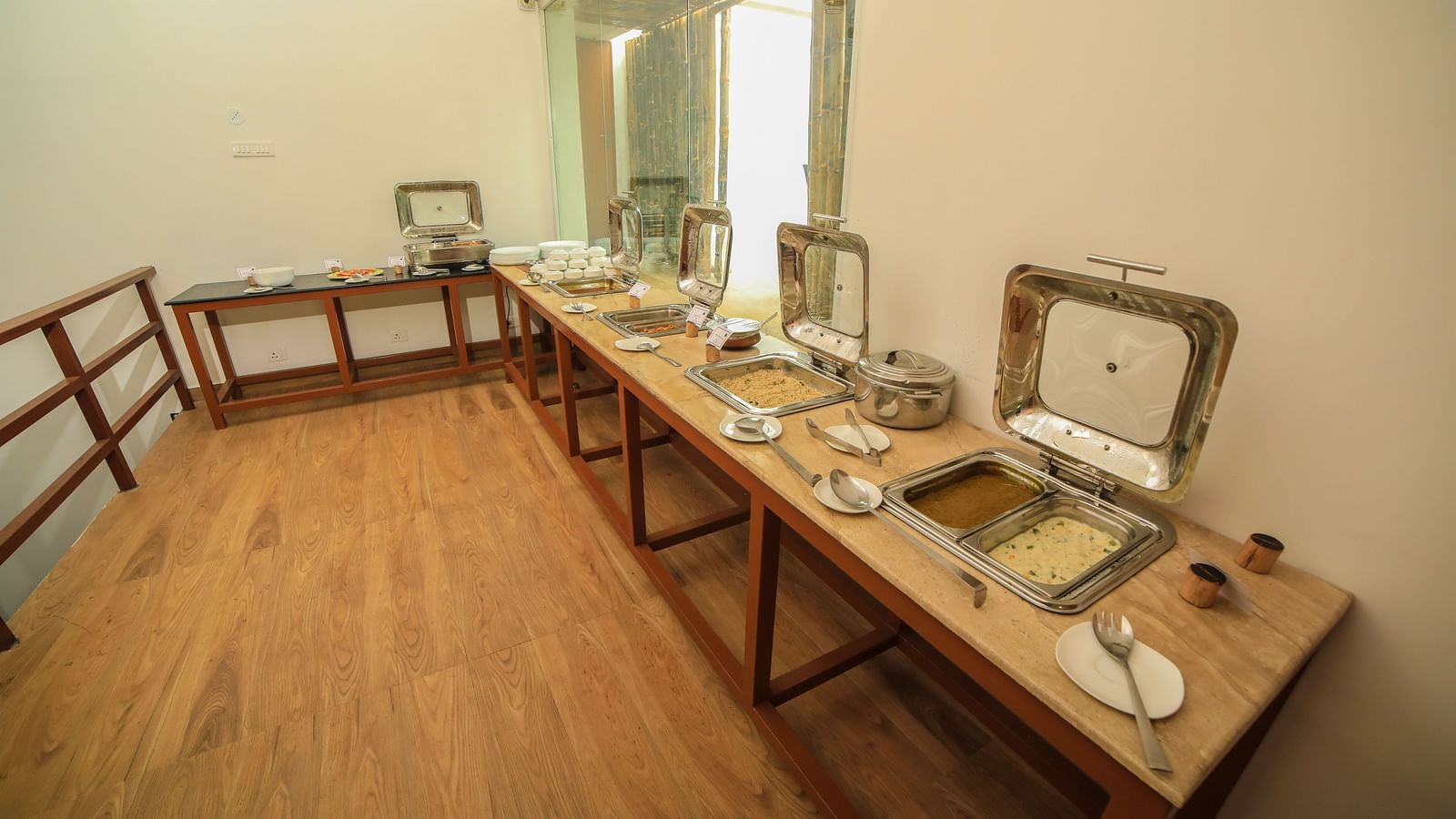 Image of a dining space with a buffet table at WOW Bison Woods.