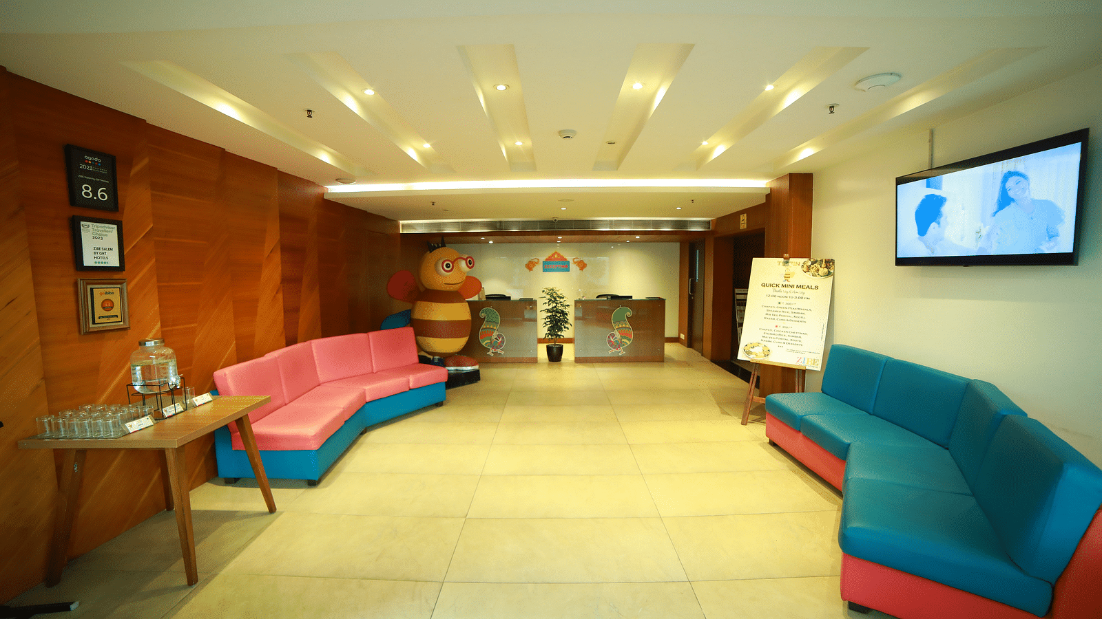 An image of the lobby illuminating lights at Zibe Salem by GRT Hotels