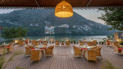 Restaurant overlooking Bhimtal lake at The Fisherman's Lodge