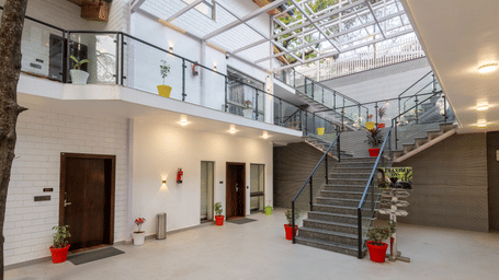 The exterior image of DLS The Emerald, Nainital where a flight of stairs is leading to the upper level