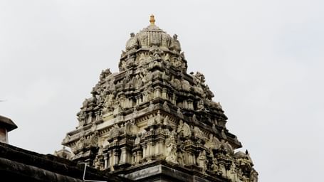 A low angle shot of a temple made of Dravidian architecture in Kanchipuram