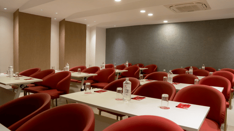 Modern meeting room with boardroom seating and long table at Mandala Norling Lords Prime Kathmandu.