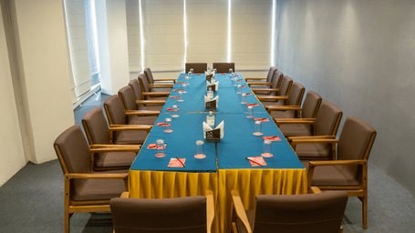 Boardroom setup with long table and chairs at Mandala Norling Lords Prime Kathmandu.