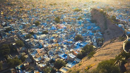 an aerial view of the city of jodhpur with blue buildings in view