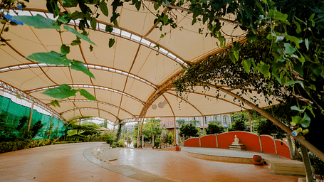 A view of the outdoor event space with the canopy and stage at Nirantara Resort & Spa.