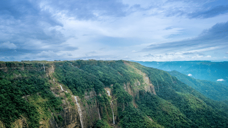 A  wide shot of scenic landscape of the Seven Sisters Falls.