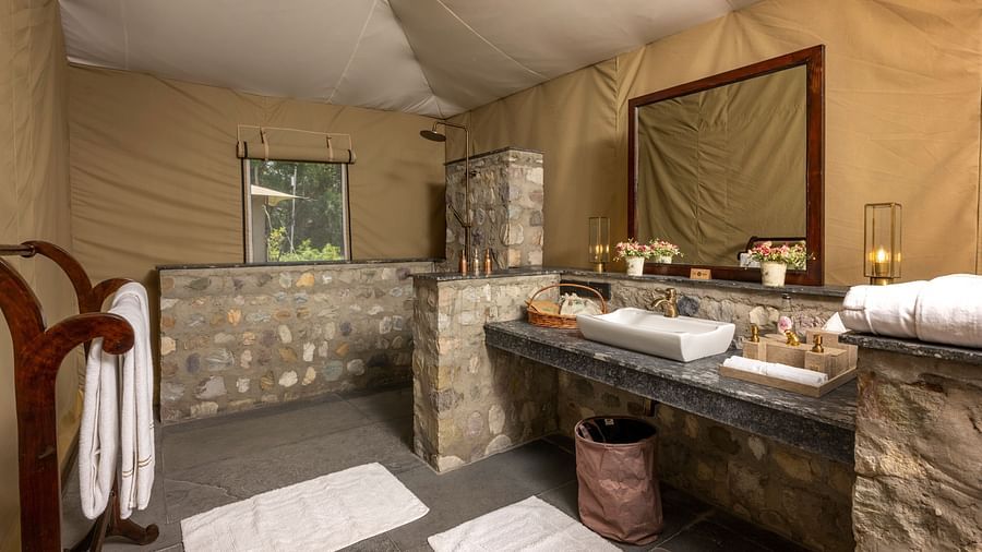 image of a bathroom with toiletry essentials - Aalia Jungle Resort & Spa