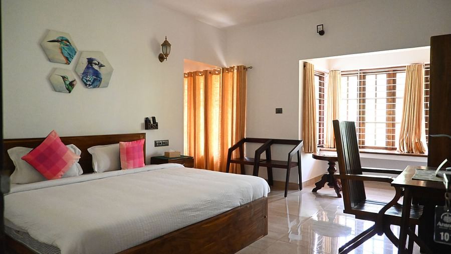 Image of a double bed in the 101 Non ac Room at Ananda Holiday Home, Wayanad 1