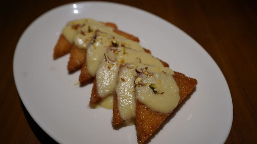 An image of a fritters decorated on platter - Argo By Trance, Goa