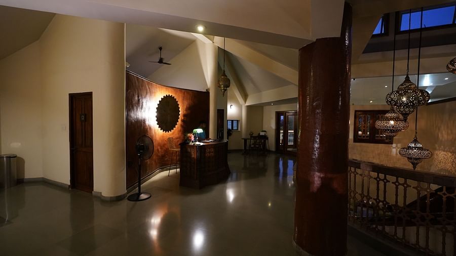 An image of a reception with dim lighting and bespoke decors - Argo by Trance, Goa