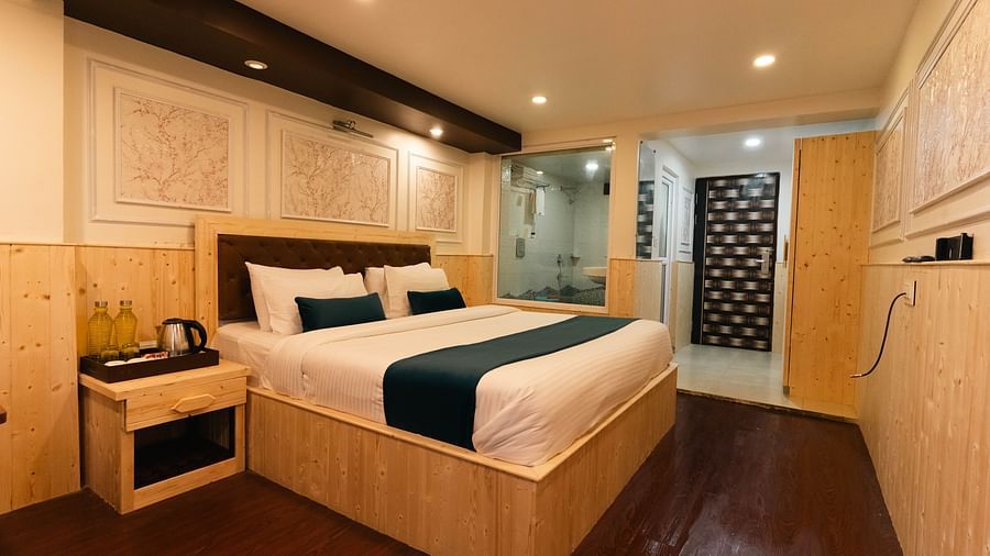 an image of a bedroom with illuminating yellow lights at Avianna New Mandala Hotel & Spa, Darjeeling