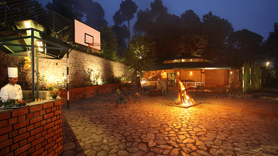 Club House at baikunth Resort, Kasauli and a bonfire during late evening - baikunth Resort, Kasauli