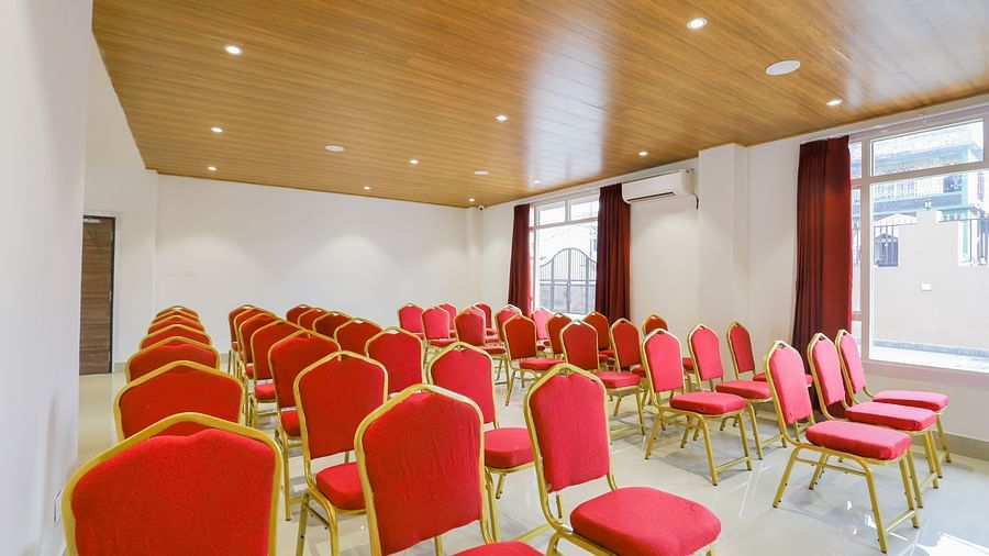 event setting with red chairs at Banari Regency by Summit, Namchi