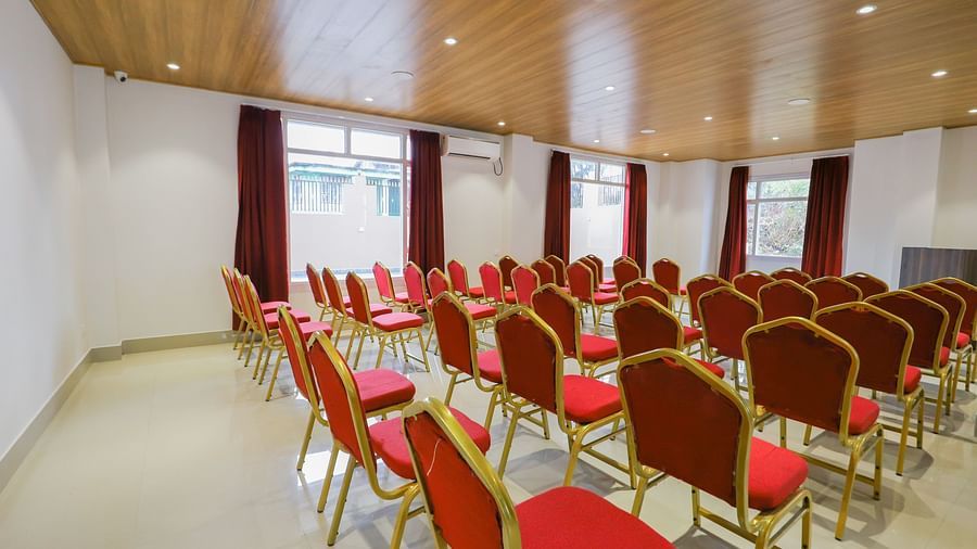 event setting with red chairs at Banari Regency by Summit, Namchi