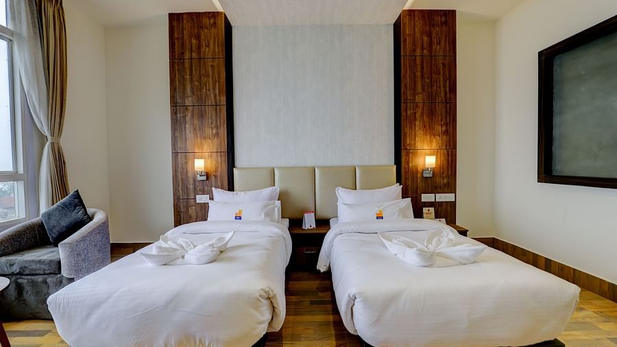 view of twin beds of a Premium Room at Banari Regency by Summit, Namchi
