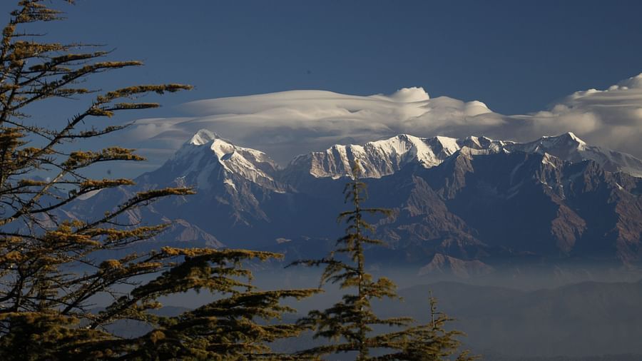 Snow-capped mountains under a clear blue sky seen from a distance - BluSalzz Escapade - Anant Rasa Resort
