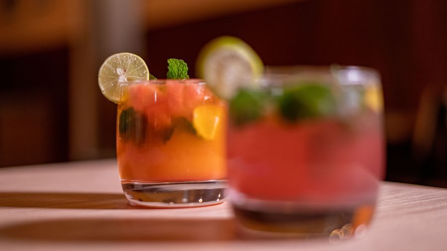 Two glasses of coloured drinks placed on a table at BluSalzz Escapade Resort, Lansdowne.