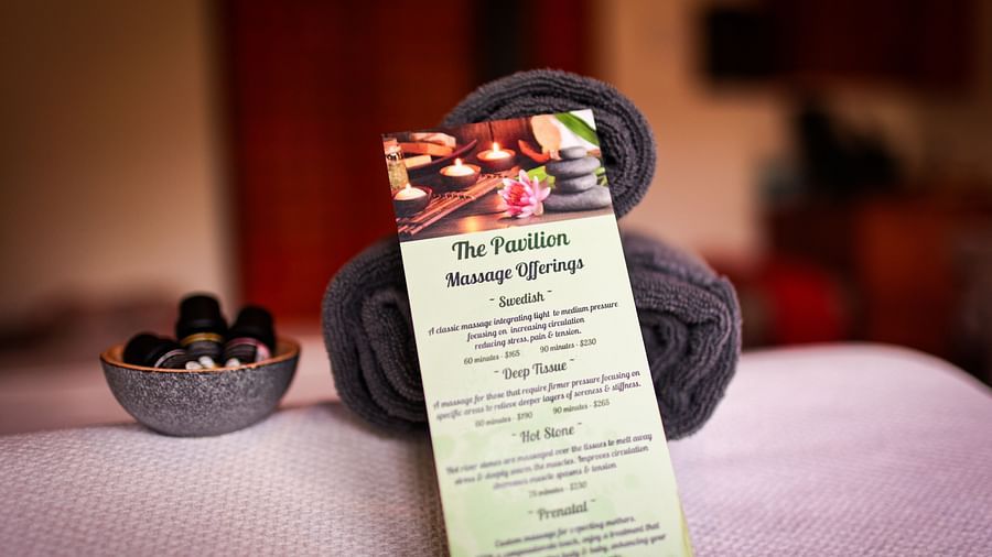 A tranquil massage table setup with spa essentials at The Pavilion, Brewery Gulch Inn & Spa