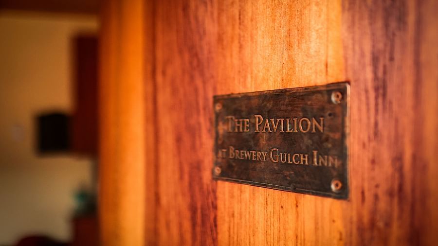 A wooden plaque marking the exclusive Pavilion spa space at Brewery Gulch Inn & Spa