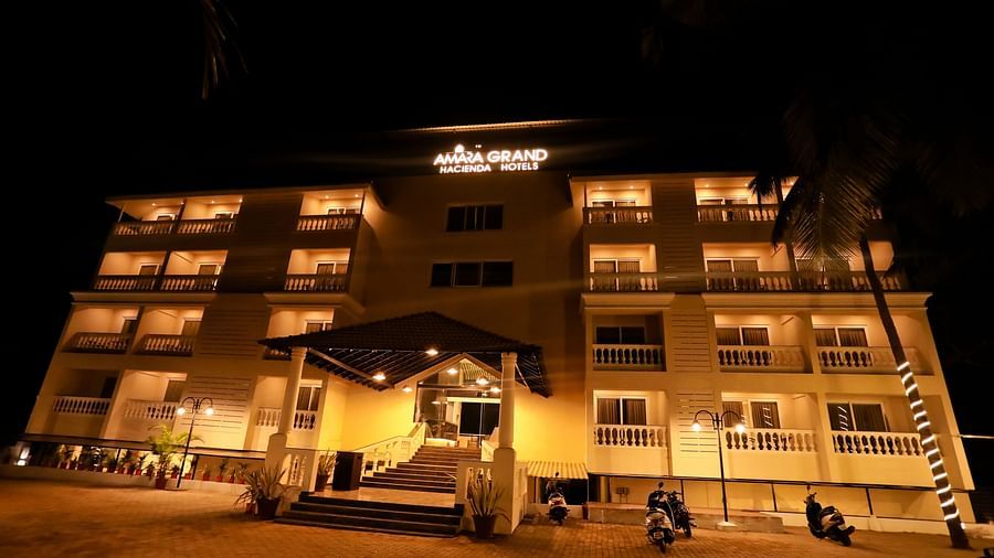 Facade of a building with Amara Grand, Hacienda Hotels written on top.