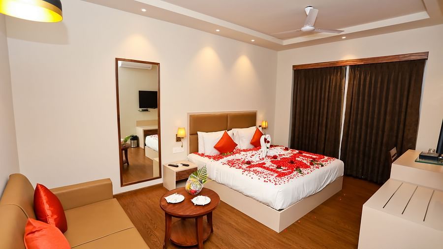 Image of a room with a bed and a sofa on the side at Calux Grand Baga.