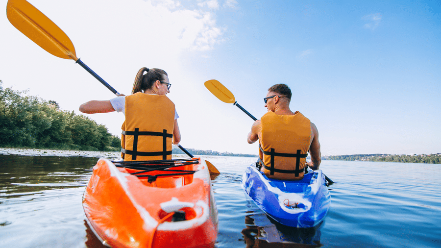 couple kayaking together in the river