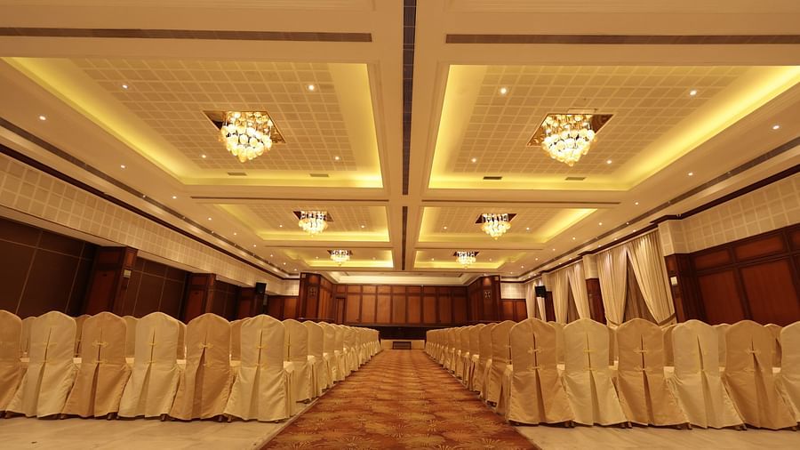 A front view of a banquet hall with chairs arranged on both sides | Cenneys Gateway