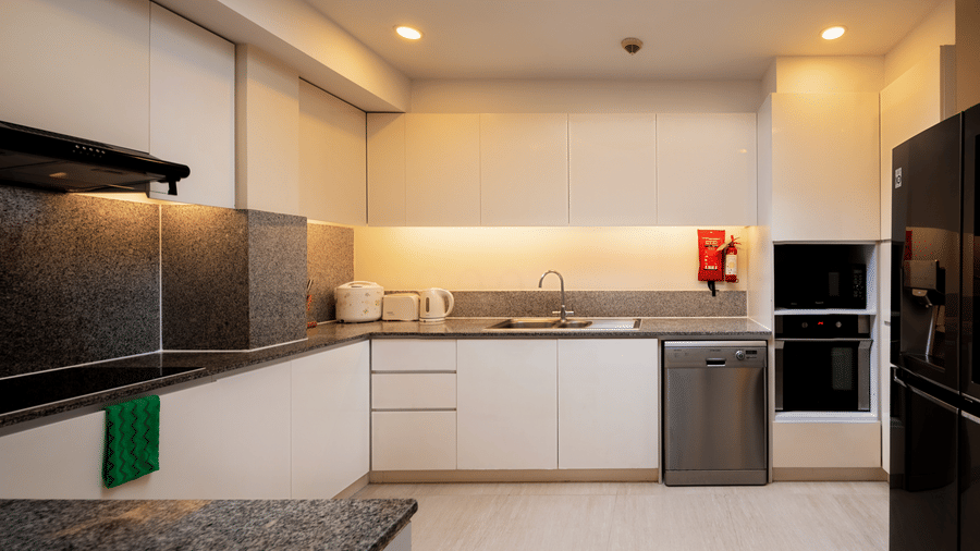 Fully equipped kitchen in the Penthouse at Central Mansions, Phnom Penh with modern appliances and ample counter space.