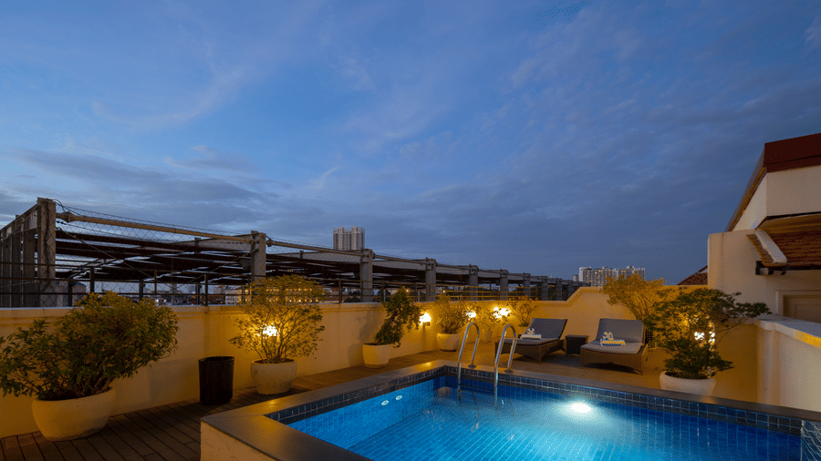 Rooftop swimming pool overlooking the surrounding cityscape at Central Mansions, Phnom Penh.