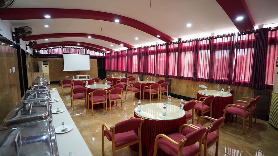 an image of an event hall with buffet arranged close to the wall at  City Centre Residency, Bangalore