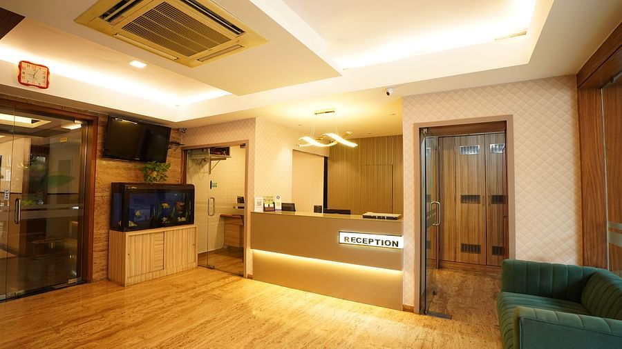 an image of a lobby with a sofa and an air-conditioner at  City Centre Residency, Bangalore